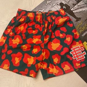 Eric Emanuel Green and Red Cheetah Print Shorts.